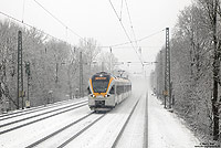 Auf der weiteren Fahrt in Richtung Rheinland nahm der Schneefall stetig zu. Zwischen Rheda Wiedenbrück und Gütersloh sah es schon sehr winterlich aus! Hier fährt die ERB89981 aus Münster nach Bielefeld Hbf. 24.1.2015