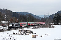 Auf dem Weg von Würzburg nach Frankfurt erreicht der RE4612 in Kürze den Bahnhof Heigenbrücken. Zuglok an diesem 6.1.2010 war die 185 555 von MRCE.